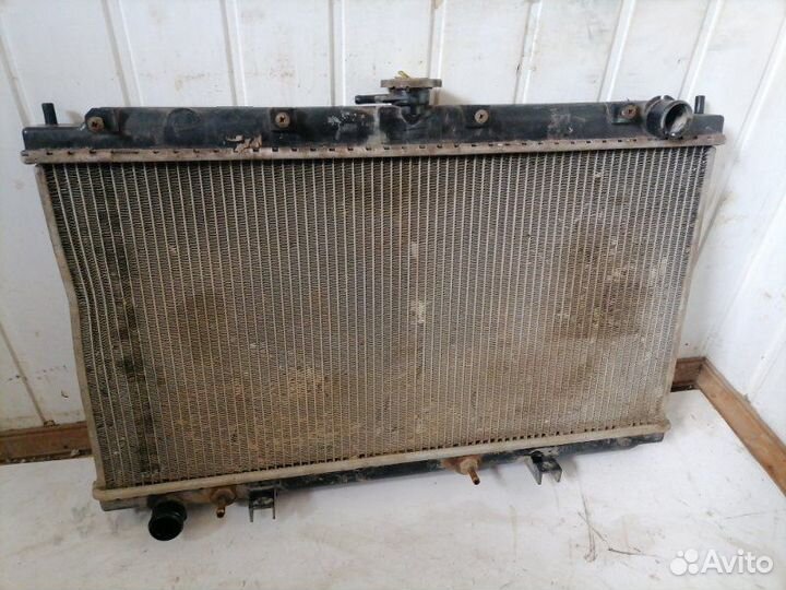 Радиатор охлаждения двигателя Nissan Primera P11