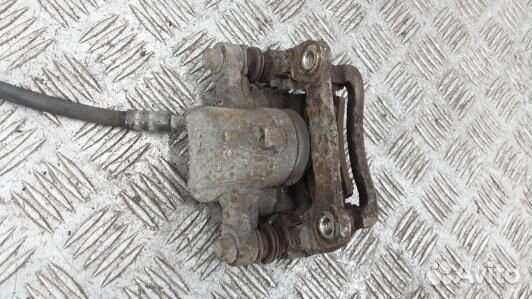 Суппорт тормозной задний правый toyota corolla E12