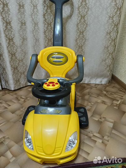 Машинка каталка с ручкой