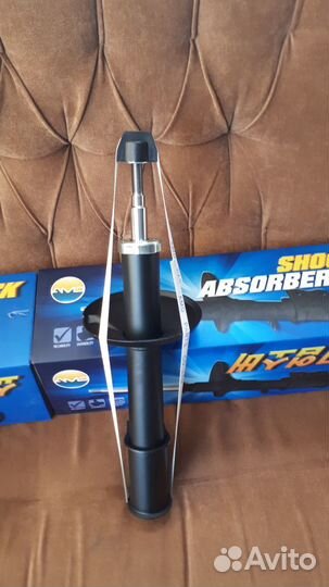 Амортизатор (стойка) передний Рено Логан Ларгус