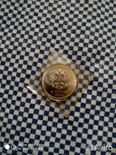Монета новая