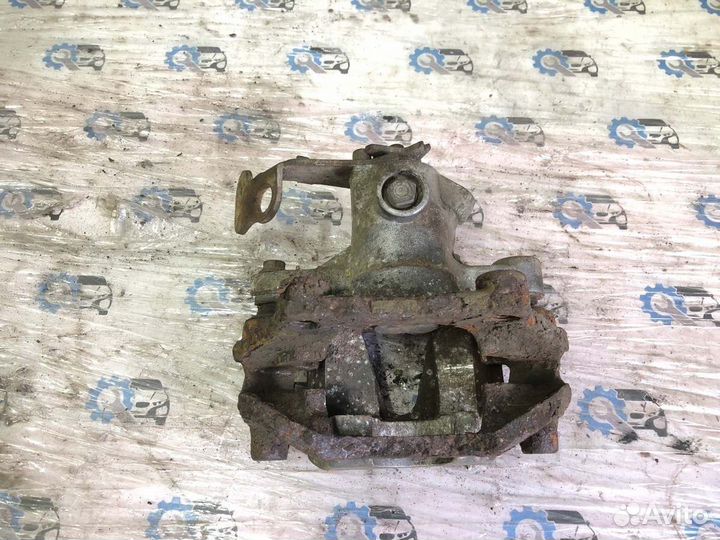 Суппорт передний левый Opel Astra G универсал