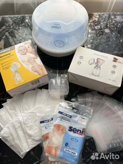 Молокоотсос medela + набор