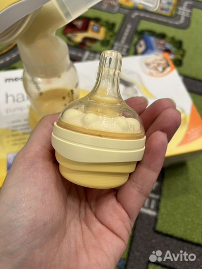 Молокоотсос ручной medela