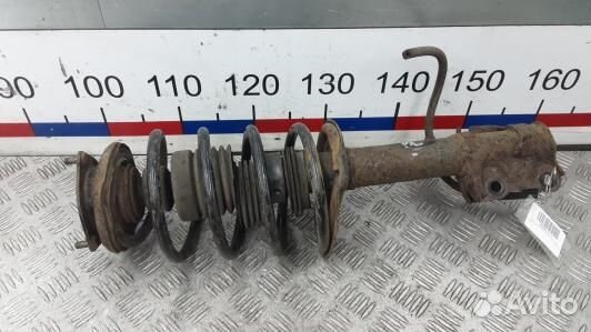 Стойка передняя левая nissan almera N16 (ZNI06K501