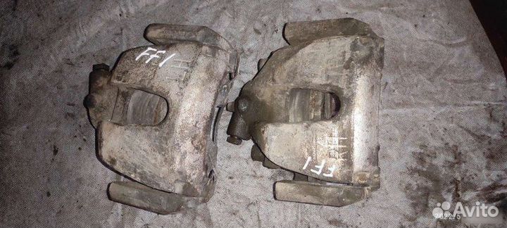 Суппорт тормозной Ford Focus