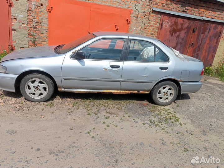 Салон Nissan Sunny B14