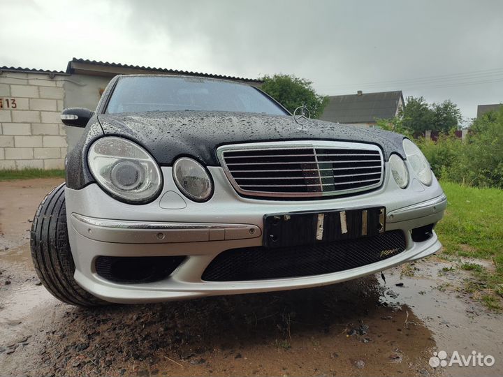 Бампер AMG e55 w211