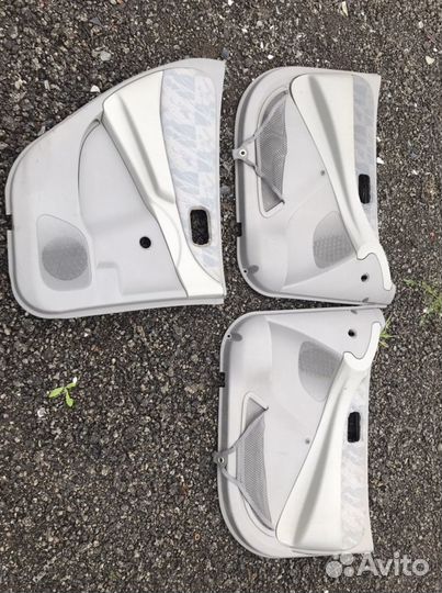 Nissan almera tino обшивки дверей