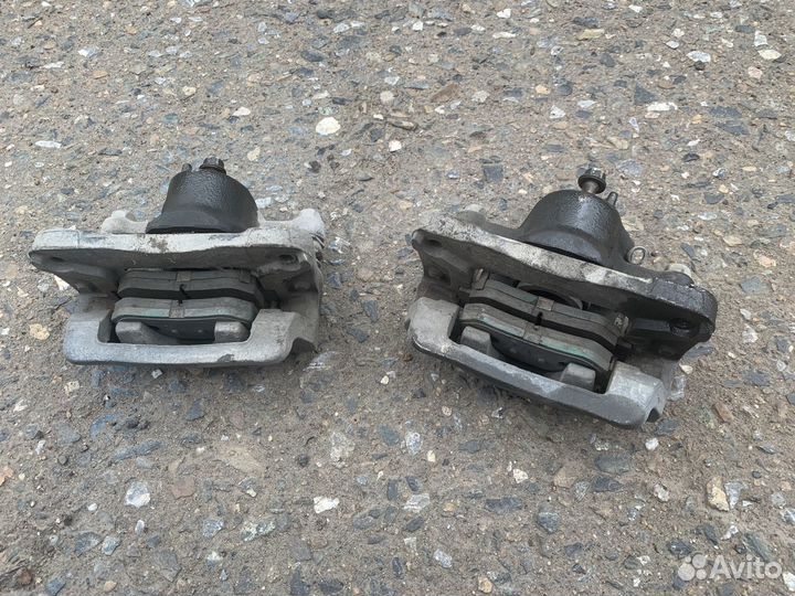 Суппорт задний левый правый Hyundai Santa Fe 1