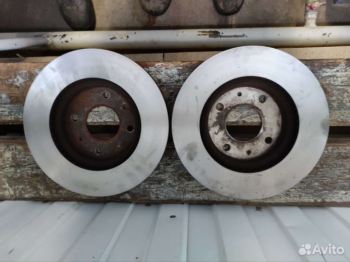 Тормозные диски передние на Lancer 9