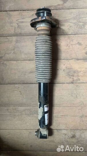 Стойка амортизатора задняя BMW X5 E35
