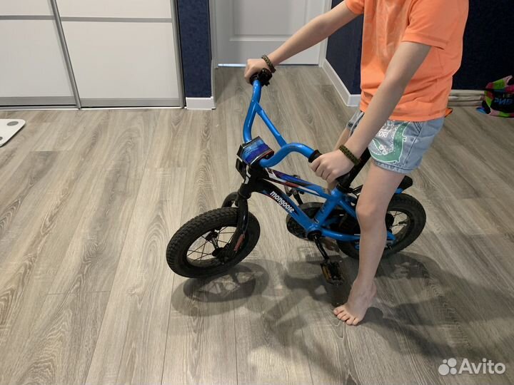 Велосипед с боковыми колесами