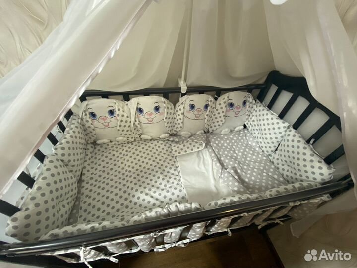 Детская кроватка с поперечным маятником