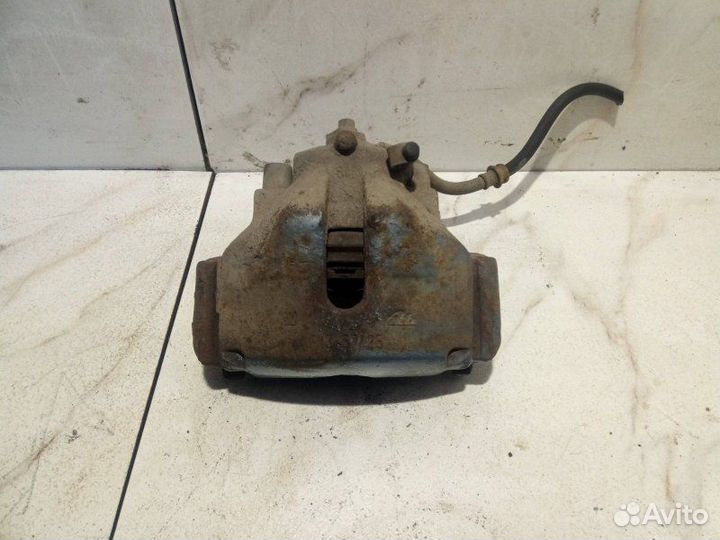 Суппорт тормозной передний левый Opel Vectra B X