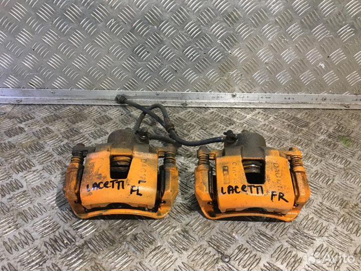 Суппорт тормозной передний левый Chevrolet Lacetti