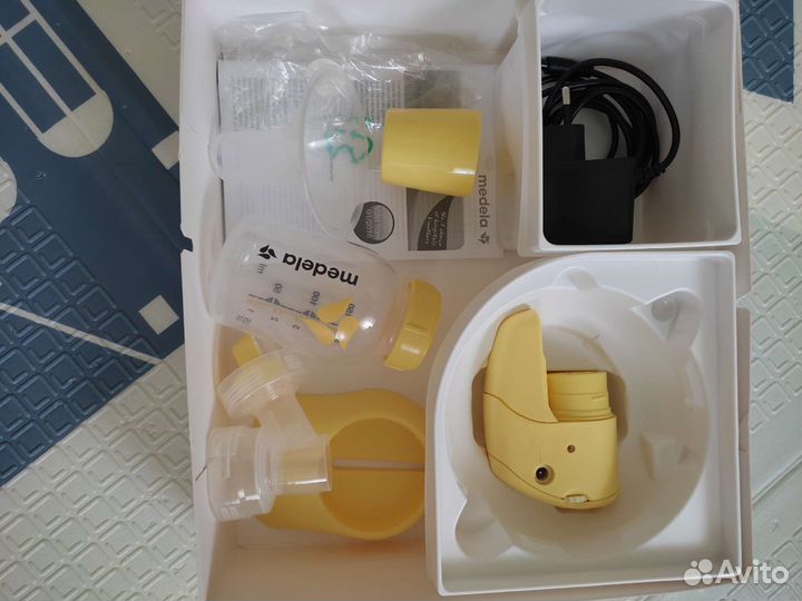 Молокоотсос medela mini электрический