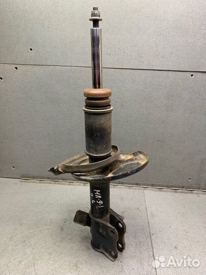 Амортизатор передний левый Mitsubishi Lancer 9