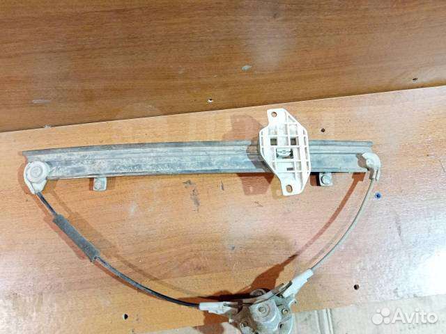 Стеклопод механ. передний левый Chevrolet Lanos