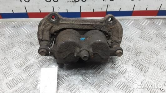 Суппорт тормозной передний левый KIA sorento 2 (SK