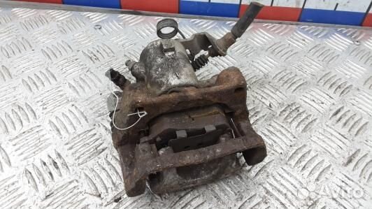 Суппорт тормозной задний правый opel zafira B (UML