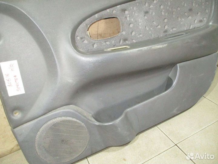 Обшивка двери передней правой Kia Spectra