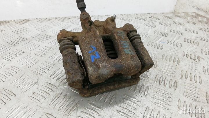 Суппорт задний левый Toyota Corolla