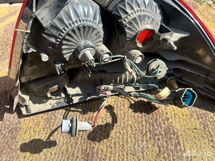 Фонарь задний левый на митсубиси лансер