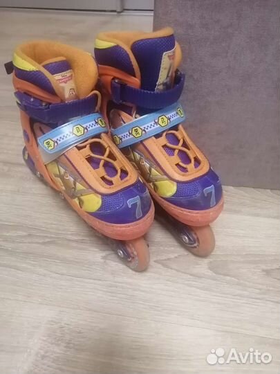 Роликовые коньки