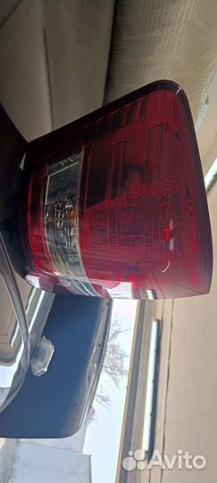 Фонарь задний левый. тоета корола Аксио 2010г.в