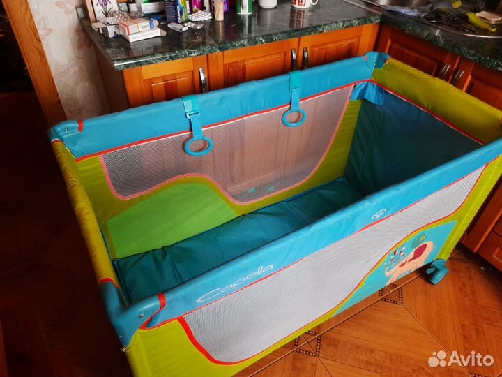 Манеж-кровать складывается в сумку