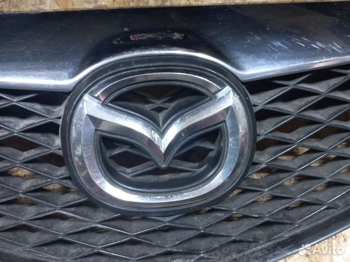 Продам решётку радиатора Mazda