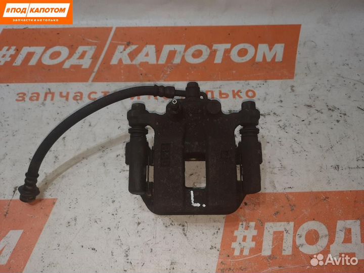 Суппорт тормозной задний левый Nissan X-Trail