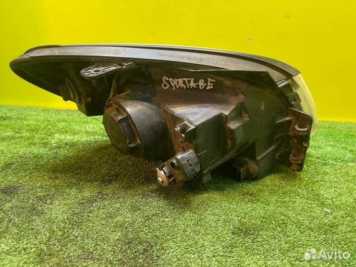 Фара галогеновая левая Kia Sportage KM G4GC 2009