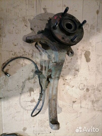 Кулак поворотный передний левый Kia Magentis