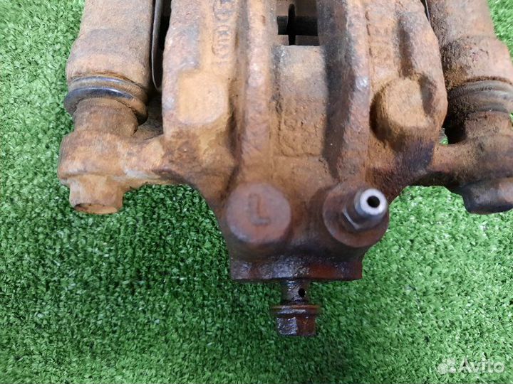 Суппорт тормозной задний левый Hyundai Ix35 2.0