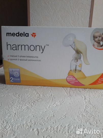 Молокоотсос medela ручной
