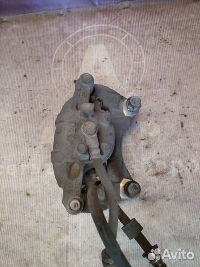 Суппорт тормозной передний левый Mitsubishi