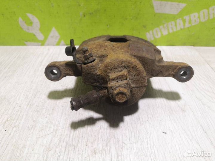 Суппорт передний левый Шевроле Ланос