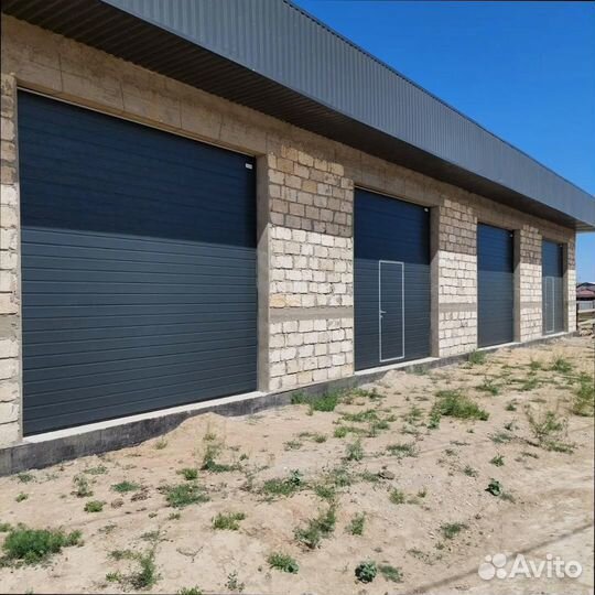 Секционные подъемные ворота с терморазрывом