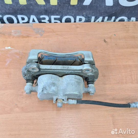 Суппорт тормозной передний правый Kia Mohave 1