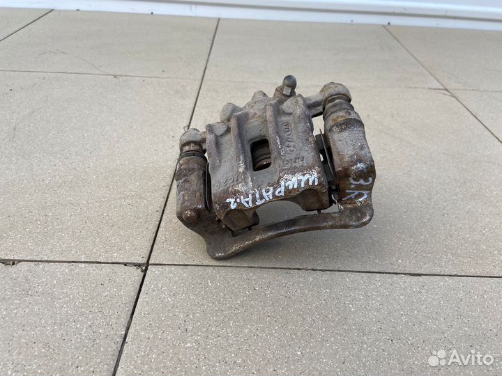Тормозной суппорт задний правый Kia cerato 2