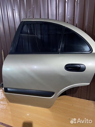 Задняя левая дверь на ниссан альмера н16