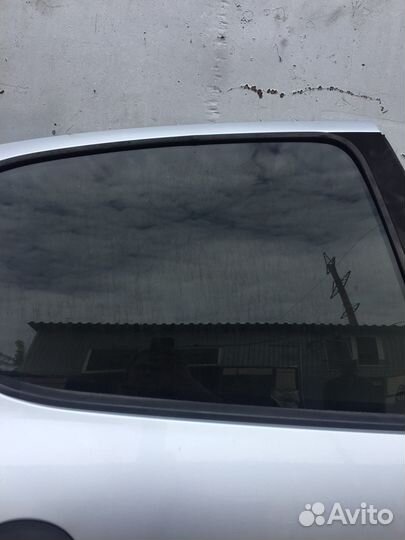 Стекло двери peugeot 206