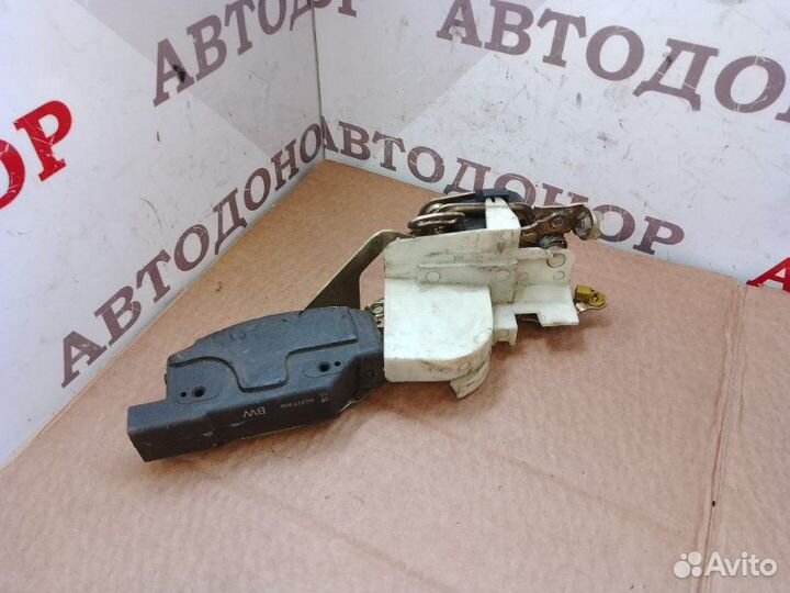 Замок двери передний левый Opel Vectra A