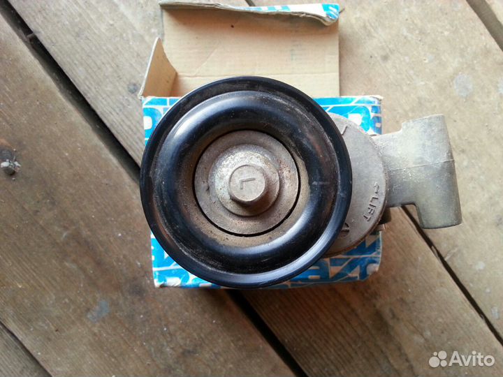 Натяжное устройство с роликом мазда,форд