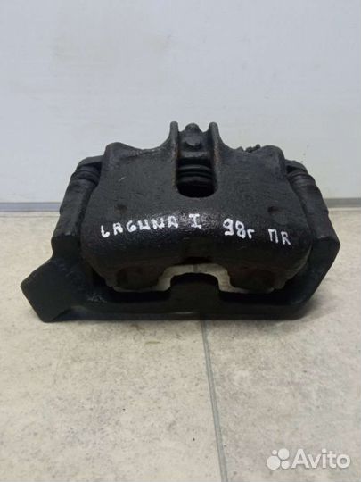 Суппорт тормозной передний правый Renault Laguna 1