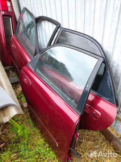 Двери на mazda 626 ge