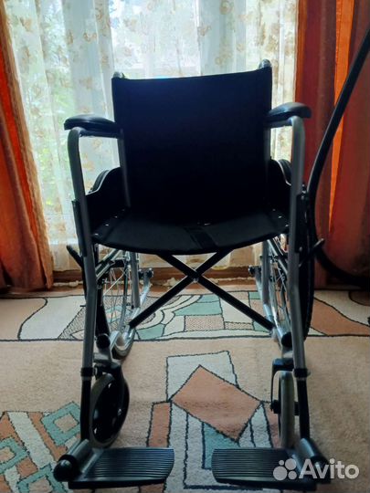 Инвалидная коляска