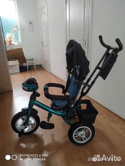 Трехколесный велосипед с родительской ручкой
